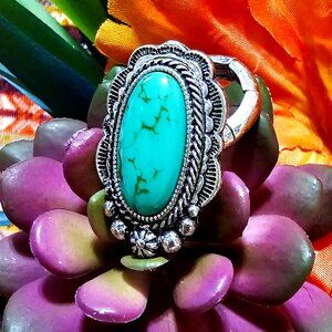 Ring. Southwestern-Style. Burnished Silver. Turquoise Stone. One Size Fits Most.